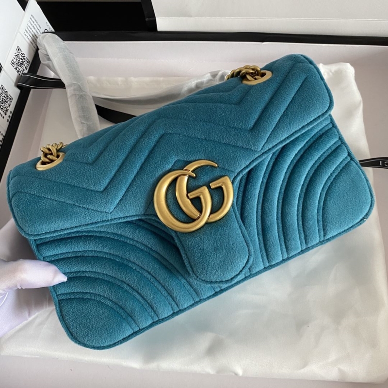 G*u*i clutch bags